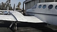 N121BD @ KRHV - Locally-based 1979 Cessna 414A 'Chancellor' sitting beside the Lafferty hangar at Reid Hillview Airport, San Jose, CA. - by Chris Leipelt