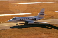 N815RC @ KDPA - Taxiing by the control tower - by Glenn E. Chatfield