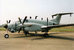 85-0147 @ EGVA - RC-12K Huron, radio callsign Argus 53,  of 1st Military Intelligence Battalion based at Wiesbaden, Germany on display at the 1994 International Air Tattoo at RAF Fairford. - by Peter Nicholson