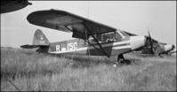 R-150 @ EHDL - the 54-2440 is standing in line with other L21B's belonging to the Grasshopper demo team during RNLAF 60 years celebration. GPLV badge on tail and wearing rare YLO stripes and nose - by Gerrit van de Veen