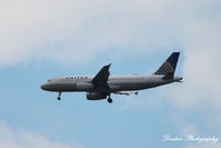 N456UA @ KSRQ - United Flight 717 (N456UA) arrives at Sarasota-Bradenton International Airport following flight from Chicago-O'Hare International Airport - by Donten Photography