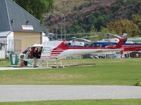 ZK-IQG @ NZQN - one of many scenic flight choppers at QN - by magnaman