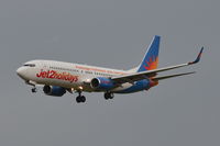 G-GDFZ @ EGSH - Landing at Norwich on a very windy afternoon. - by Graham Reeve