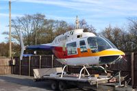 DU-103 @ EGNP - airframe parked on trailer at Coneypark heliport next to LBA in UK(EGNM) with rotors and parts missing, no identification and not totally confirmed to be c/n 1193, - by Jez-UK