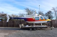 DU-103 @ EGNP - airframe parked on trailer at Coneypark heliport next to LBA in UK(EGNM) with rotors and parts missing, no identification and not totally confirmed to be c/n 1193, - by Jez-UK