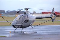 G-CILR @ EGNM - sat outside one of Multiflights hangers,used for basic rotary training, - by Jez-UK