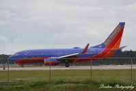 N7728D @ KRSW - Southwest Flight 667 (N7728D) arrives at Southwest Florida International Aiport following flight from General Mitchell International Airport - by Donten Photography