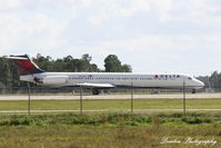 N977DL @ KRSW - Delta Flight 1458 (N977DL) arrives at Southwest Florida International Airport following flight from Hartsfield-Jackson Atlanta International Airport - by Donten Photography