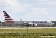 N897NN @ KRSW - American Flight 1276 (N897NN) arrives at Southwest Florida International Airport following flight from Dallas/Fort Worth International Airport - by Donten Photography