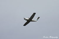 N28SW - Piper Cherokee (N28SW) flies over Manasota Beach - by Donten Photography