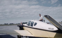 N9526R - This was Franklin Millers 4th Bonanza.  The picture, taken at the Meadville, Pa airport, has future Pennsylvania governor, Raymond Shaffer, leaning on the propeller with Franklin Miller standing on the wing. - by Dorothy Miller by her son Lohring Miller