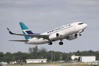 C-GWSQ @ KSRQ - WestJet Flight 1187 (C-GWSQ) departs Sarasota-Bradenton International Airport enoute to Toronto-Pearson International Airport - by Donten Photography