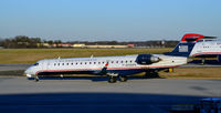 N705PS @ KCLT - Taxi to park CLT - by Ronald Barker
