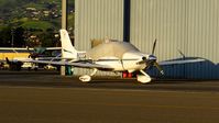 N232PL @ KRHV - South County-based 2001 Cirrus SR20 parked in front of the Trade Winds hangar, possibly for maintenance at Reid Hillview Airport, San Jose, CA. - by Chris Leipelt