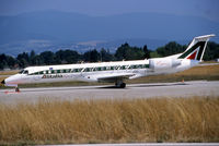 I-EXML @ LSGG - Waiting before departure with special '700th Embraer' titles - by Shunn311