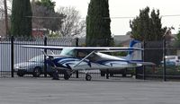 N201AA @ KRHV - California-based 1959 Cessna 150 parked next to the Aerial Avionics hangar at Reid Hillview Airport, San Jose, CA. No doubt the best Cessna 150 I've ever seen! - by Chris Leipelt