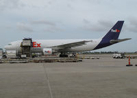 N717FD @ KMSY - loading process at New Orleans airport - by olivier Cortot
