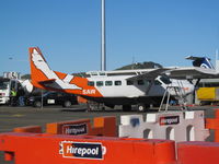 ZK-SAW @ NZWN - on sunny welly apron - by magnaman