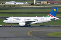 V5-ANK @ FAJS - Air Namibia A319 towed to its gate after some tlc at SAA mainanance facility. - by FerryPNL