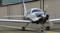 N1285V @ KRHV - Locally-based 2008 Cessna 400 with passenger taking a picture of me taking a picture of him at Reid Hillview Airport, San Jose, CA. - by Chris Leipelt