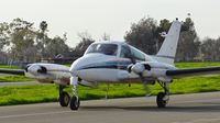 N7589Q @ KRHV - Temptation Motors LTD (Hayward, CA) 1970 Cessna 310Q taxing out for departure at Reid Hillview Airport, San Jose, CA. - by Chris Leipelt