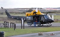 ZJ239 @ EGFH - Visiting helicopter coded R operated by SARTU. - by Roger Winser