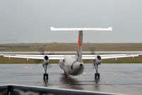 VH-TQD @ NZNS - A stormy and rainy day in Nelson - by Micha Lueck