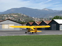 N98661 @ SZP - 1946 Piper J3C-65 CUB, Continental C75 75 Hp upgrade, taxi off Rwy 22L grass - by Doug Robertson