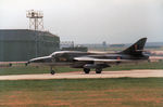 XL609 @ EGQS - Hunter T.7 of 12 Squadron taxying after landing at RAF Lossiemouth in the Summer of 1984. - by Peter Nicholson