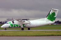 C-GANI @ CYUL - De Havilland Canada DHC-8-301 Dash 8 [064] (Air Canada Jazz) Montreal-Dorval~C - by Ray Barber