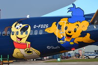 G-FDZG @ EGSH - Close up of new logo's on the aircraft. - by Graham Reeve