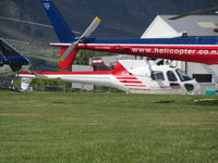 ZK-HQG @ NZQN - on helicopter grass apron - by magnaman