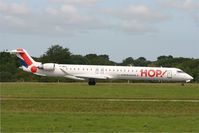 F-HMLE @ LFRB - Canadair Regional Jet CRJ-1000, Taxiing to holding point rwy 25L, Brest-Bretagne airport (LFRB-BES) - by Yves-Q