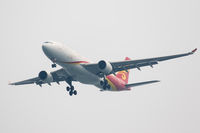 B-LNE @ VHHH - On finals for Hong Kong, inbound from Shanghai - by alanh