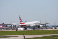 N794AN @ KDFW - AA 772 touches down 18R. - by Darryl Roach