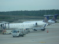 N12201 @ IAH - ERJ-145XR - by Christian Maurer