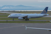 N443UA @ CYVR - Taxiing for take-off, south runway. - by Remi Farvacque