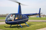 G-EVEV @ EGBR - Robinson R44 Raven ll at Breighton Airfield, April 2010. - by Malcolm Clarke