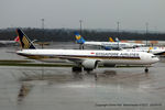 9V-SNB @ EGCC - Singapore Airlines - by Chris Hall