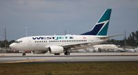 C-GWSI @ MIA - Westjet - by Florida Metal