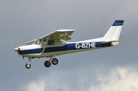 G-BZHE @ EGSH - Landing at Norwich. - by Graham Reeve