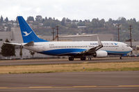 B-6490 @ KBFI - Boeing 737 after touchdown. - by Eric Olsen