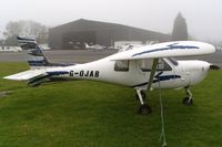 G-OJAB @ EGTR - Fuel injection? Taken on a quiet cold and foggy day. With thanks to Elstree control tower who granted me authority to take photographs on the aerodrome. - by Glyn Charles Jones