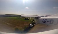 OE-DJW @ LOGG - Making a touch&go at Punitz Airfield/LOGG, Austria - by Paul H