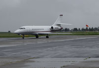 N229QS @ KAPC - NetJets 2001 Dassault Falcon 2000 arriving from KSMO @ rainy Napa County Airport, CA - by Steve Nation