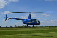 G-IAJJ @ EGCB - Robinson R44 Raven 11 on Pleasure Flights. - by David Burrell