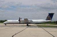 N204WQ @ KRFD - DHC-8-402