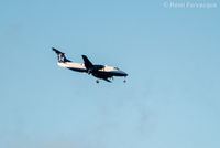 C-GBPC @ CYVR - Landing. Sorry about the blurriness, was a ways away. - by Remi Farvacque