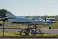 N5988M @ KAWO - Parked at north end of field - by Remi Farvacque