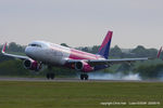 HA-LYT @ EGGW - Wizzair - by Chris Hall